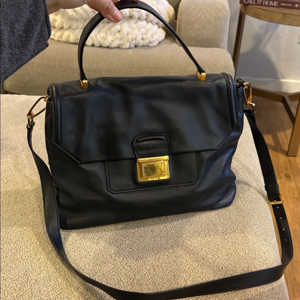 Miu Miu Black Leather bag with Gold Details